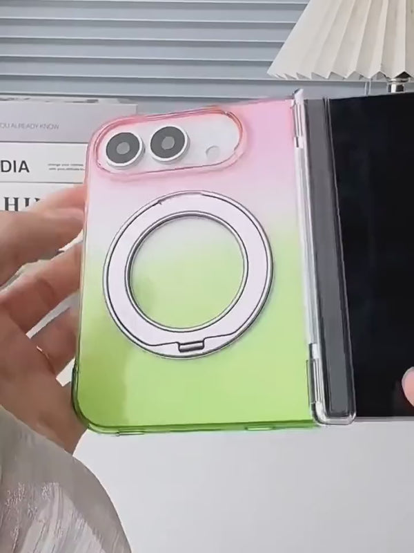 Hands fold closed a silver folding phone fitted with a pink-to-green gradient rear case.