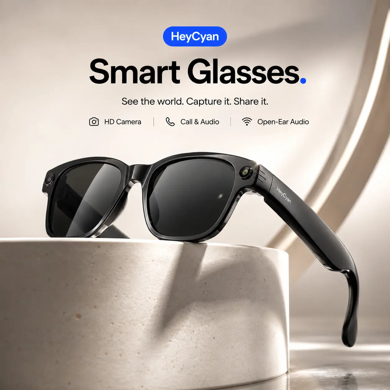 Black SmartVision camera glasses displayed on a stone pedestal